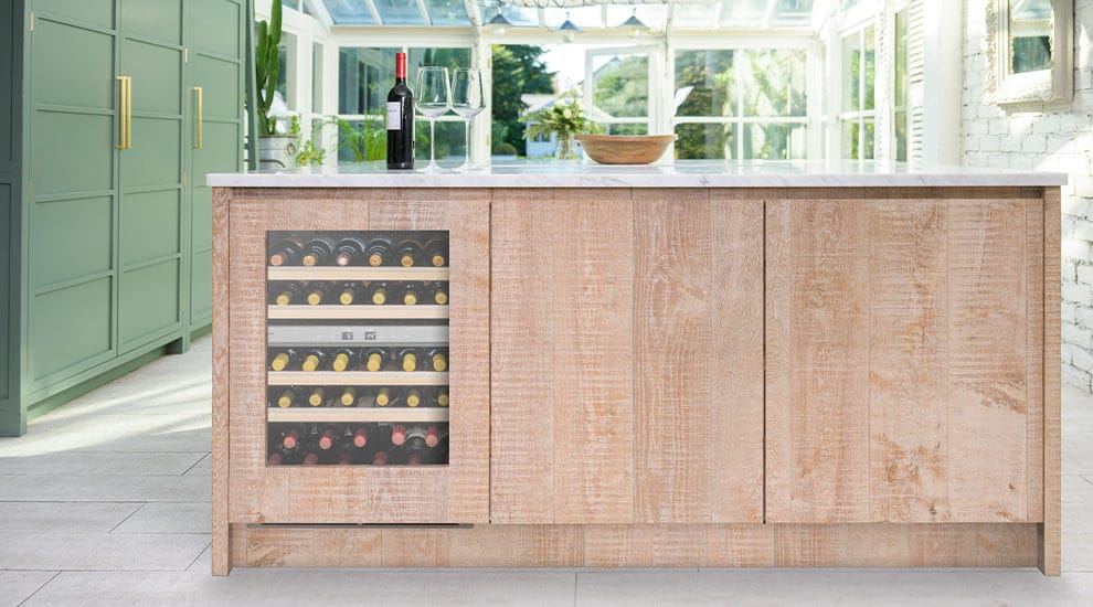 60cm Wine Cooler with Furniture surround door and wine bottle with glasses
