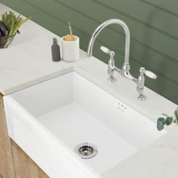Ceramic sink with traditional matching dual control tap