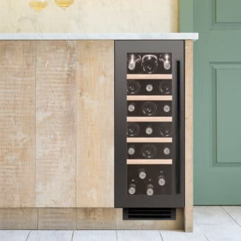 30cm Wine Cooler Single Zone in Gunmetal in a green and wood kitchen
