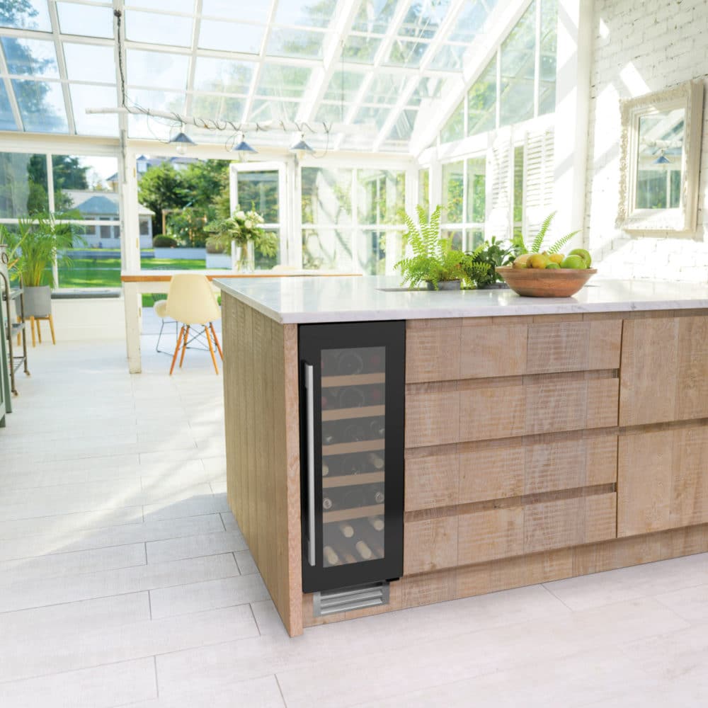 30cm Wine Cooler Single Zone in Black Glass in a green and wood kitchen