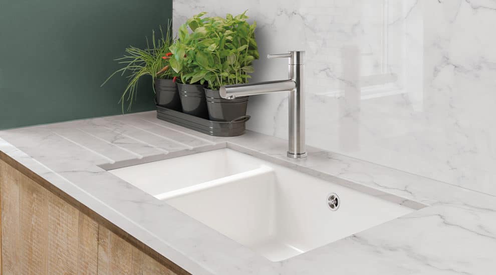 Stainless steel tap with ceramic sink