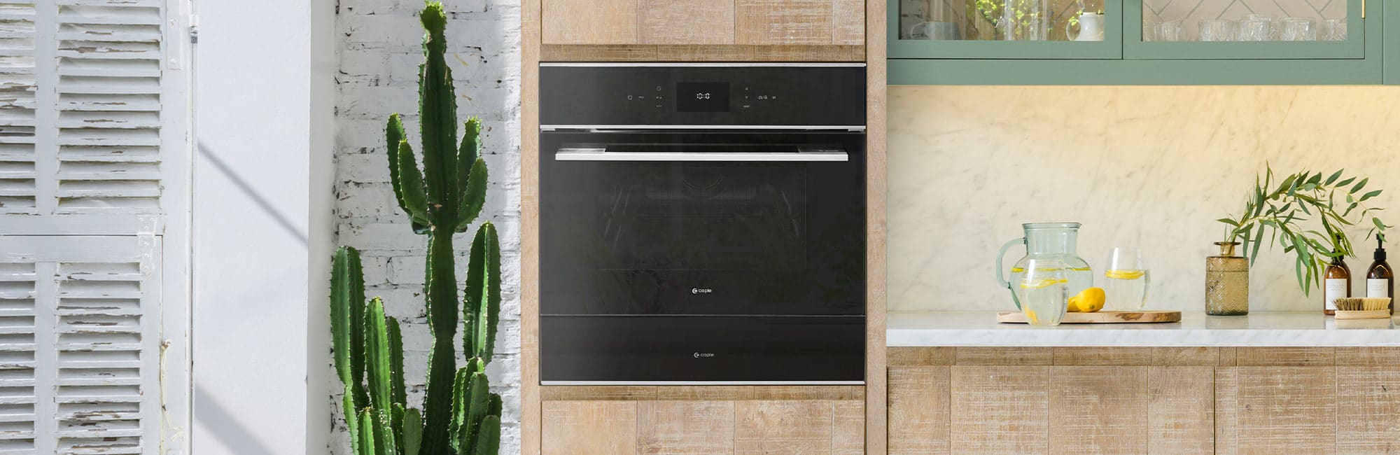 Built-in black glass combi microwave and steam oven